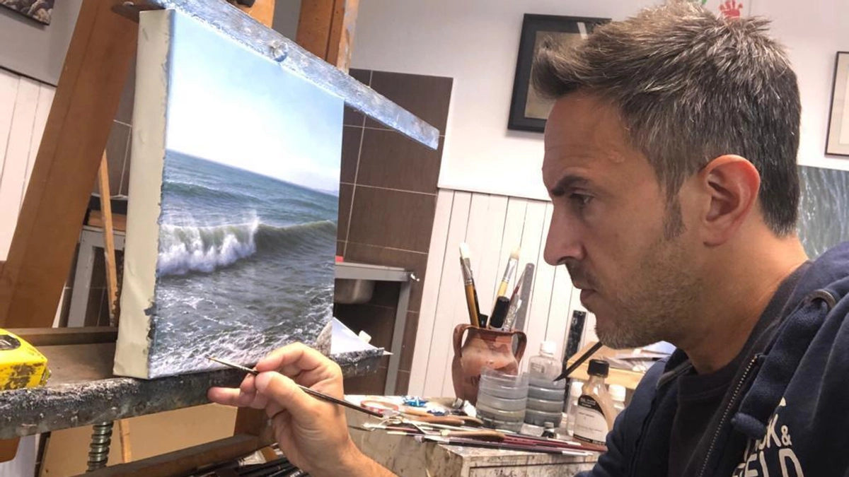 José Carlos Robles de la Cruz pintando